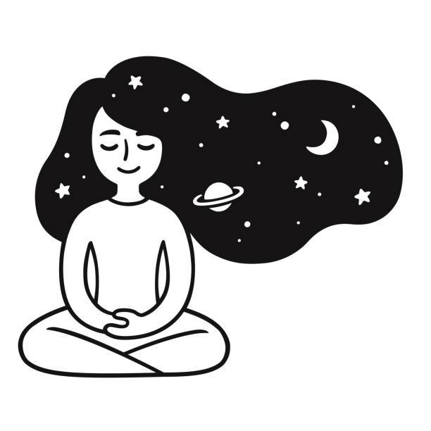 girl sitting peacefully with her eyes closed with the night sky flowing through her hair